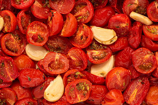 Blank food photography of roasted tomatoes, garlic, oregano, roast, herb, organic, diet, oil, vegetarian, vegetable, vegan, background