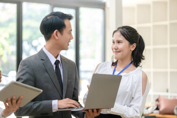 istock Businesspeople working on their project together in office room. 1514190519