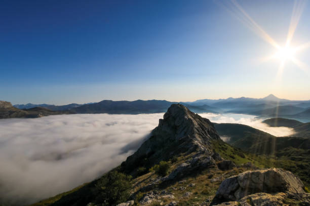 istock landscape at sunrise with clouds and mist over the mountains 1514241328