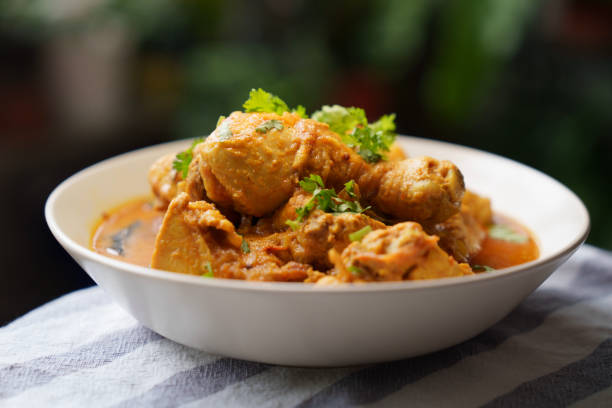 istock Indian curry chicken served in white bowl 1514255824