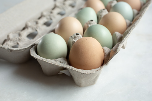 A view of a carton of farm fresh eggs.