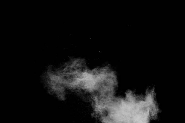 istock Freeze motion of white particles on pink background. Abstract white dust explosion. 1514276032