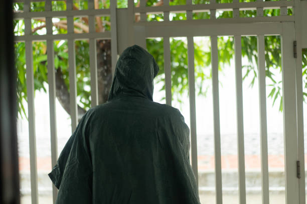 Man in raincoat in the rain