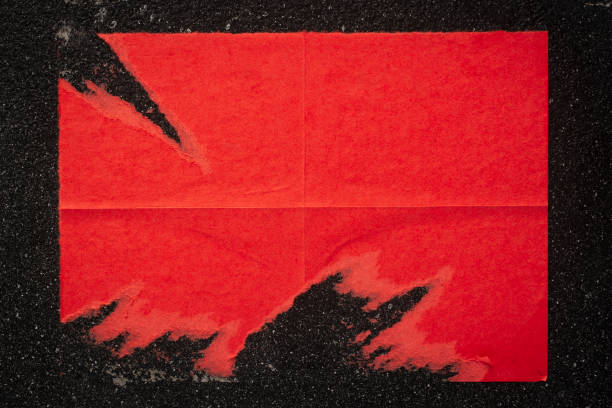 istock Red street poster on a black wall. 1514344568