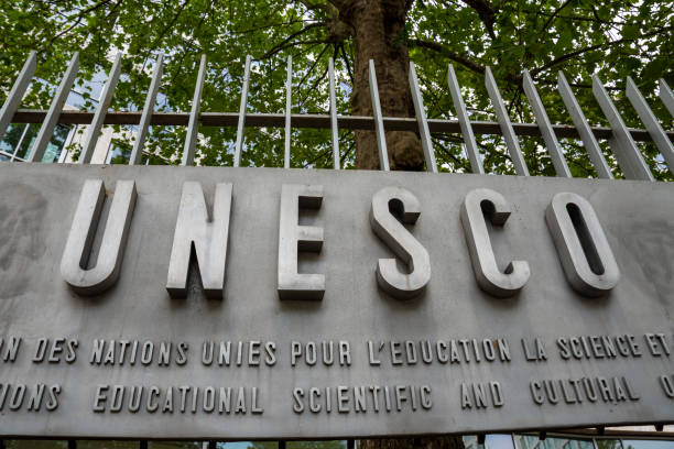 Sign outside the headquarters of UNESCO, Paris France Paris, France - July 4, 2023: Sign outside the headquarters of UNESCO, an international institution of the United Nations specialized in education, science and culture unesco world heritage site stock pictures, royalty-free photos & images