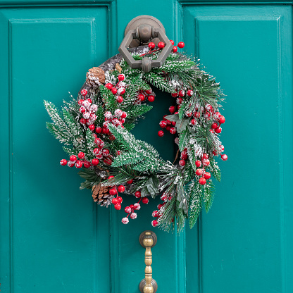 Christmas Decoration on a Beautiful Door in the Old Town of Martina Franca, in Italy on Blurred Background