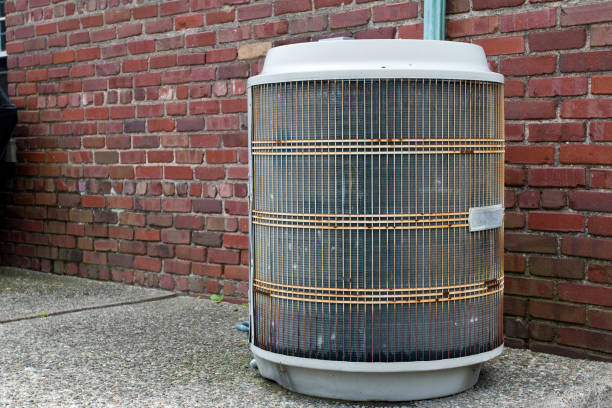 istock Air Conditioning unit on side of building 1514382269
