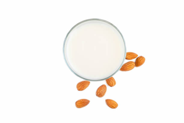 istock Almonds and almond milk on the white background 1514388733