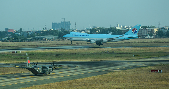 Saigon, Vietnam - Apr 13, 2016. Vietnam Air Force CASA C-295M military cargo aircraft taxiing on runway of Tan Son Nhat Airport (SGN).