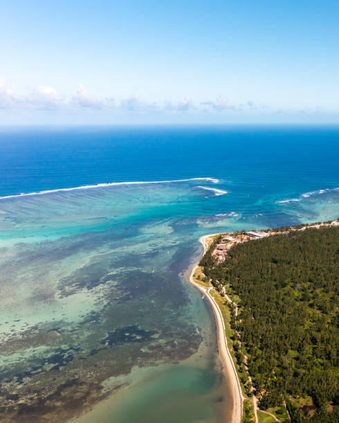 istock Wind surfers, turquoise ocean, beach and coral reefs from high angle view in Le Morne beach, Mauritius 1514457162