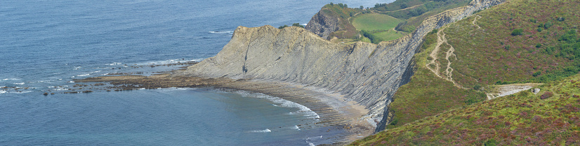 Panoramic view of Flysch de Zumaia, sequence of sedimentary rock layers Gipuzkoa, Euskadi, Basque Country, Spain
