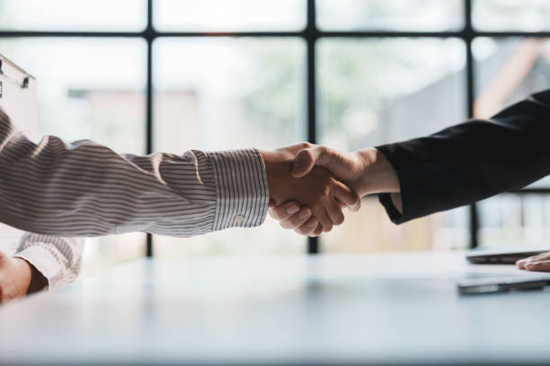istock Business people shaking hands during a meeting. 1514489359