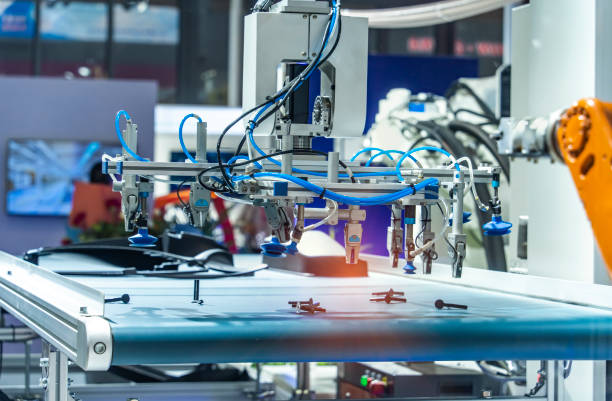 istock Automatic industrial robotic robot working, industry 4.0 and technology concept 1514540564