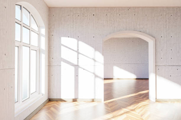istock luxurious loft apartment with arched window and minimalistic interior living room design; 3D Illustration 1514547844