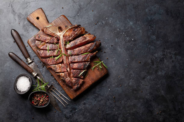 istock Grilled porterhouse beef steak. Sliced T-bone 1514672459