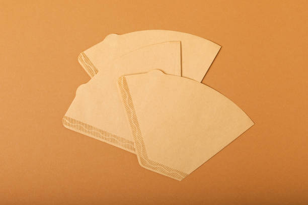 istock Background with coffee, coffee beans, ground and instant, coffee filter on brown retro background. Copy space, top view. Flat lay 1514699948