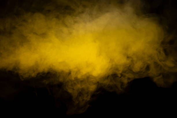 istock Yellow steam on a black background. 1514705832
