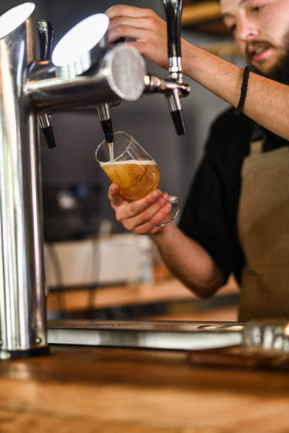istock A Glass Of Beer Being Poured By Bartender 1514727243
