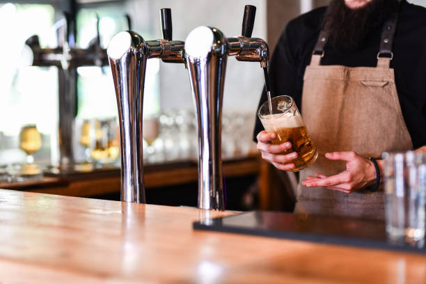 istock A Bartender's Work Post And Occupation - Pouring Beer 1514728826