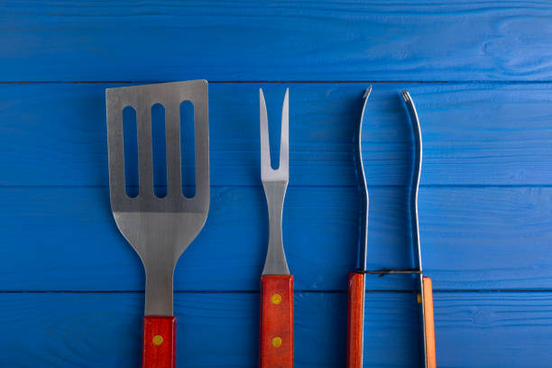 Burnt stovetop spatula of plastic burned by accident in the kitchen ,Common object used in the kitchen