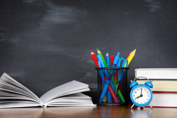 istock Alarm clock, books and school accessories 1514775511