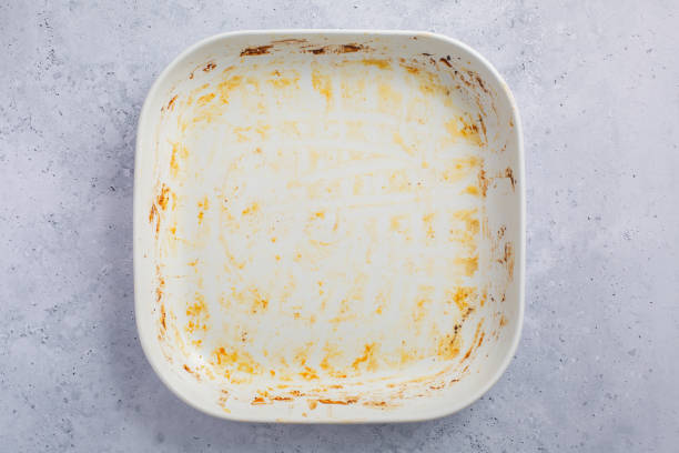 istock Baking tray or casserole with burnt on grease 1514871564