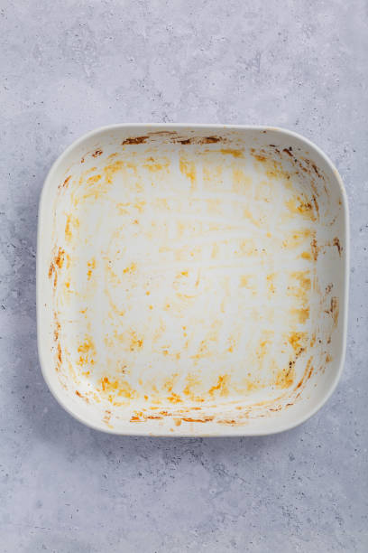 istock Baking tray or casserole with burnt on grease 1514871566