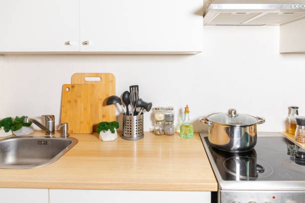 istock Scandinavian classic minimalistic kitchen with white and wooden details. Modern white kitchen clean contemporary style interior design. 1514880977