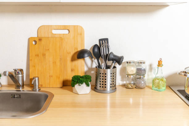 istock Scandinavian classic minimalistic kitchen with white and wooden details. Modern white kitchen clean contemporary style interior design. 1514881530