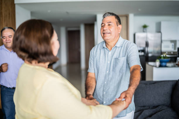 istock Senior friends dancing and having fun at home 1514907582