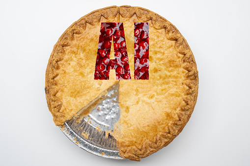 Cherry pie with a missing slice viewed in a flat lay. There is a cut out on the top crust in the shape of letters AI, concept of everyone wanting a piece of the AI pie. Isolated on white with clipping path