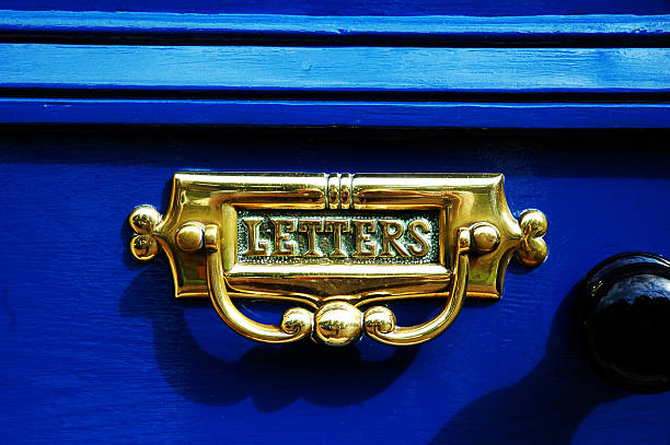 Brass letterbox stock photo