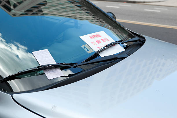 istock XXXL Parking Ticket Under Windshield Wiper On Car, Warning Sign 151509943