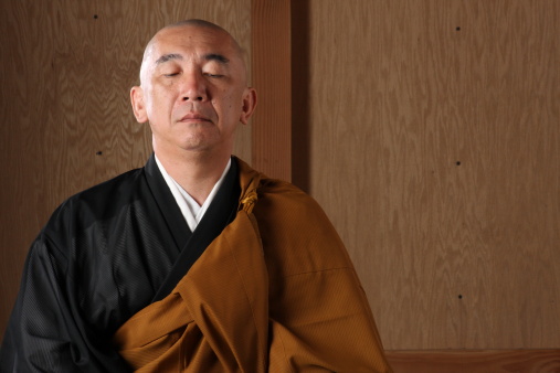 A Japanese Buddhist monk is meditating