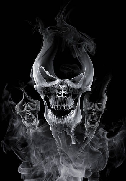 istock White skulls made from smoke against a black background 151512214