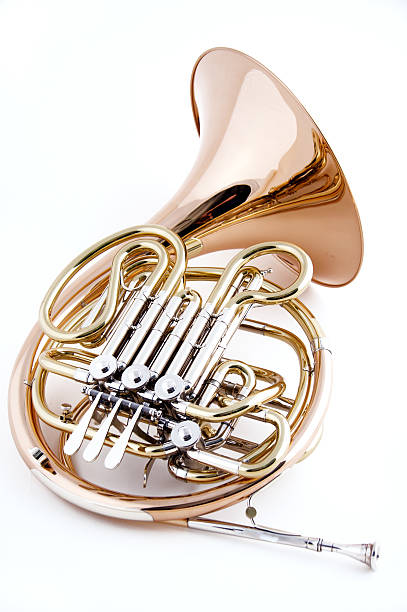 Isolated image of a shiny gold french horn on a pure white backdrop. 3d render