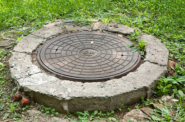 Manhole cover stock photo