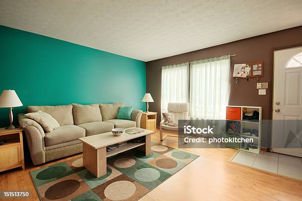 Teal And Brown Family Room Stock Photo - Download Image Now - Living Room, Turquoise Colored, Front Door