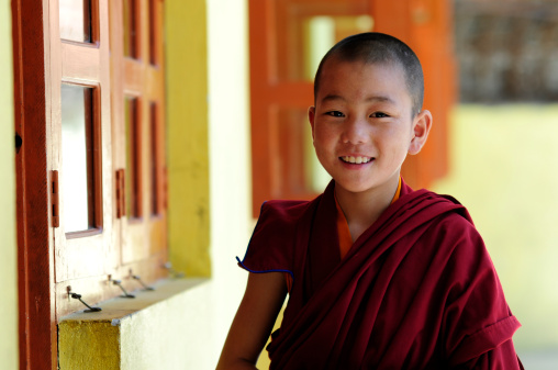 Smiling little boy monk , Janangpa School, Nepal