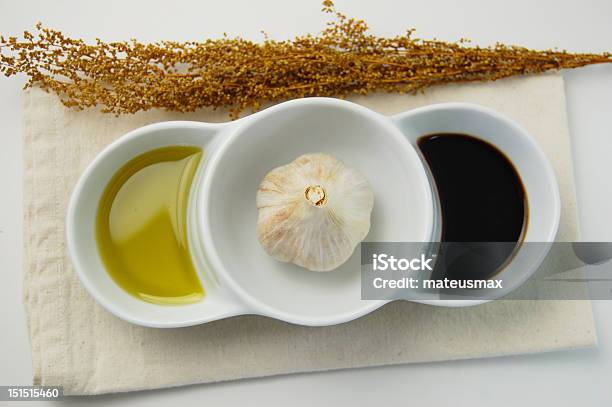 Garlic In A Dipping Bowl Stock Photo - Download Image Now - Balsamic Vinegar, Bowl, Dipping Sauce