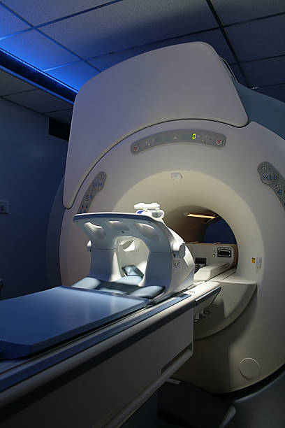 istock A MRI machine in a dim medical room 151515669