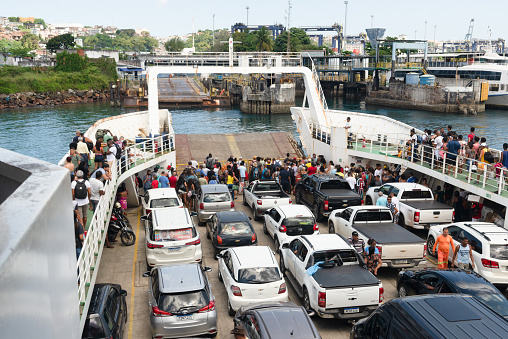 Salvador, Bahia, Brazil - September 11, 2022: Passengers and cars waiting to disembark from the ferry boat after sea crossing. Salvador, Bahia