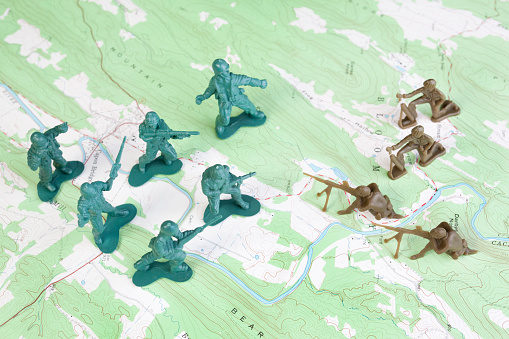 Plastic Army Men Fighting on Topographic Map. The map was produced by the U.S. Geological Survey and is in the public domain