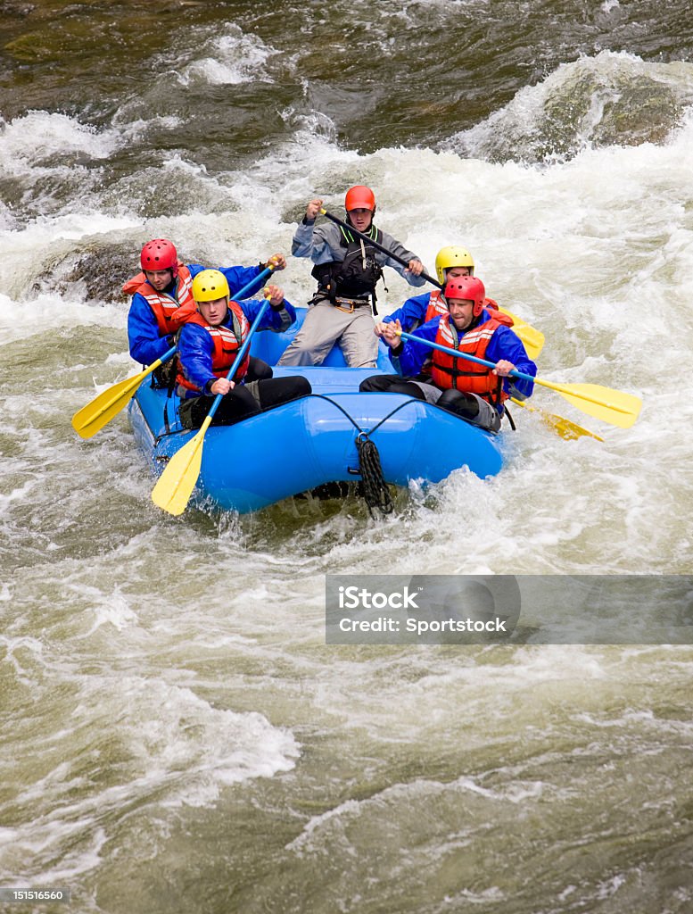 White Water Rafting In Colorado Group of four people with guide river rafting in Buena Vista, Colorado USA. White Water Rafting Stock Photo