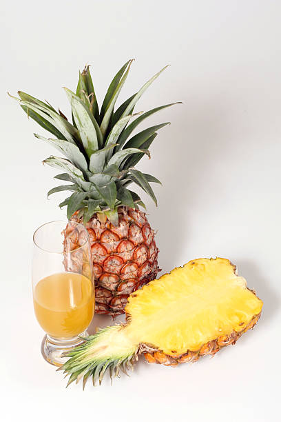 Pineapple and juice stock photo