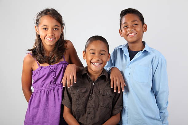 istock Three cheerful school friends share happy moment in studio 151516688