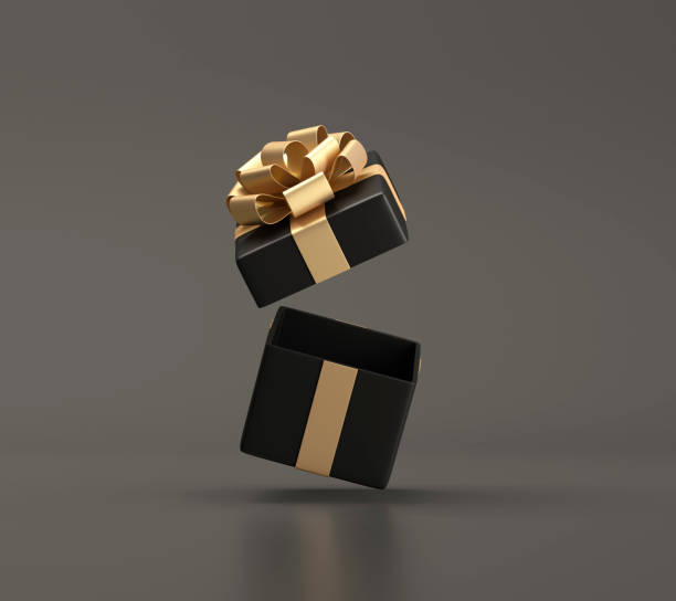 istock Black open gift box with gold ribbon 1515167685