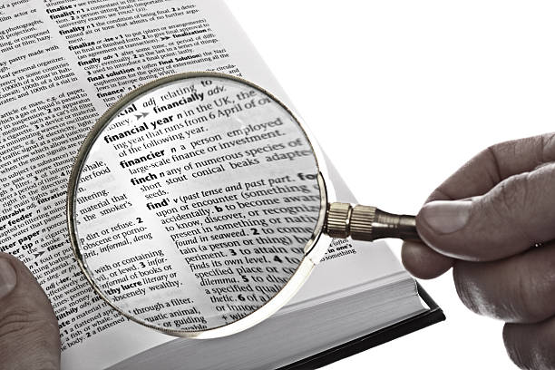 Search with a magnifying glass stock photo