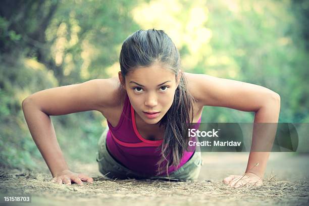 Exercise Woman Training Doing Pushups Outside Stock Photo - Download Image Now - 20-29 Years, Active Lifestyle, Activity