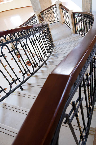 istock winding staircase with forged rail 151519464